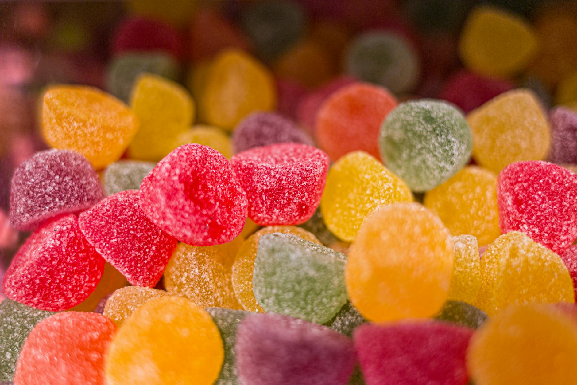 a close up shot of a candies with sugar